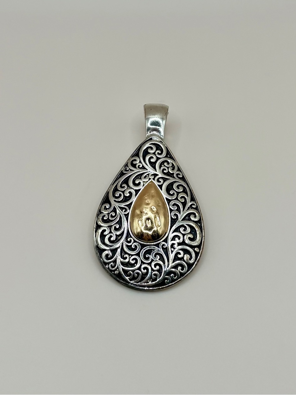 Silver-Tone Scroll-Work Teardrop Pendant with Gold Accent